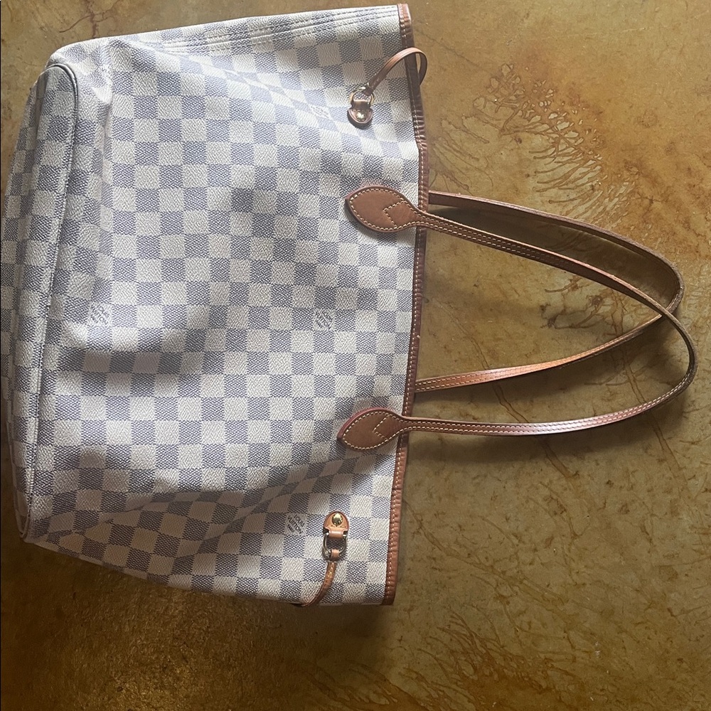 Louis Vuitton White and Tan Checkered Tote
Deleting closet within 24 Hrs. $400 - Picture 5 of 6